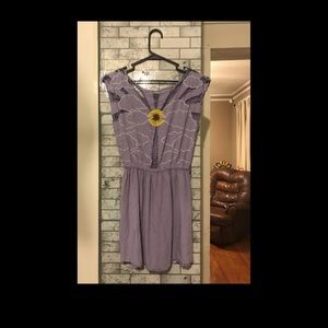 Gorgeous purple knee length dress with sunflower